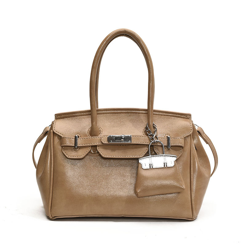 A new 2025 trendy Korean-style retro platinum handbag for women, a niche and high-end single-shoulder crossbody bag Item Picture