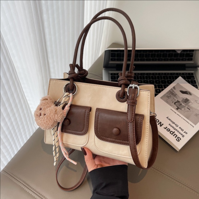 The 2025 new summer Korean-style handbag features a niche design for women, including tote bags, multi-pocket single-shoulder bags, and fashionable crossbody bags full figure