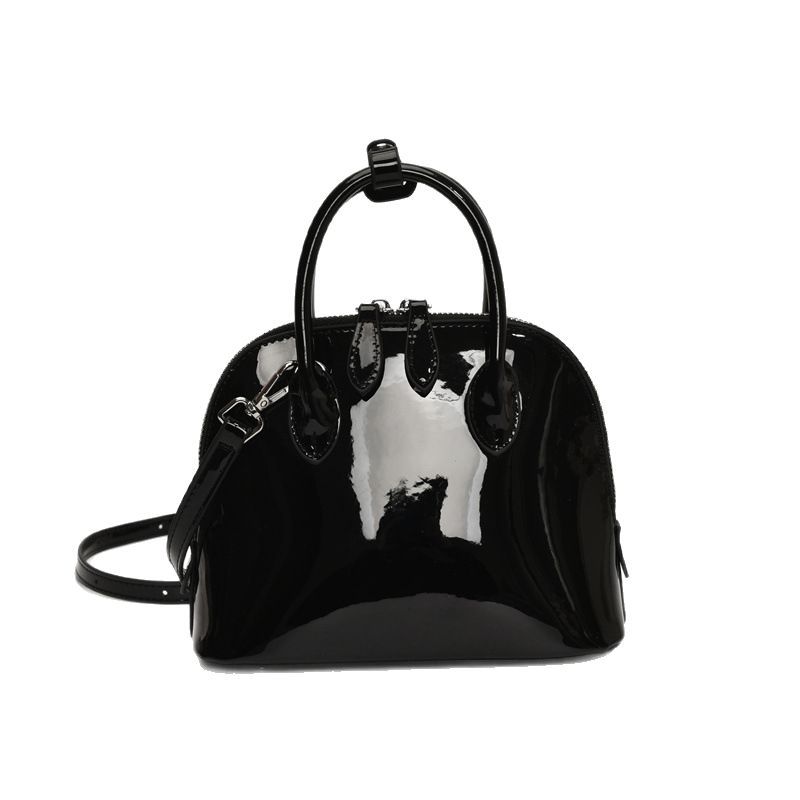 A new 2025 stylish, simple and versatile hand-held shell bag with a glossy finish and solid color for commuting. It's a casual single-shoulder crossbody bag Item Picture
