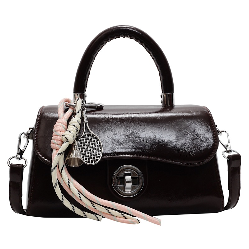 This is a popular retro oil wax leather handbag for foreign trade. It is a new, niche and trendy single-shoulder bag with a versatile and fashionable small square style Item Picture