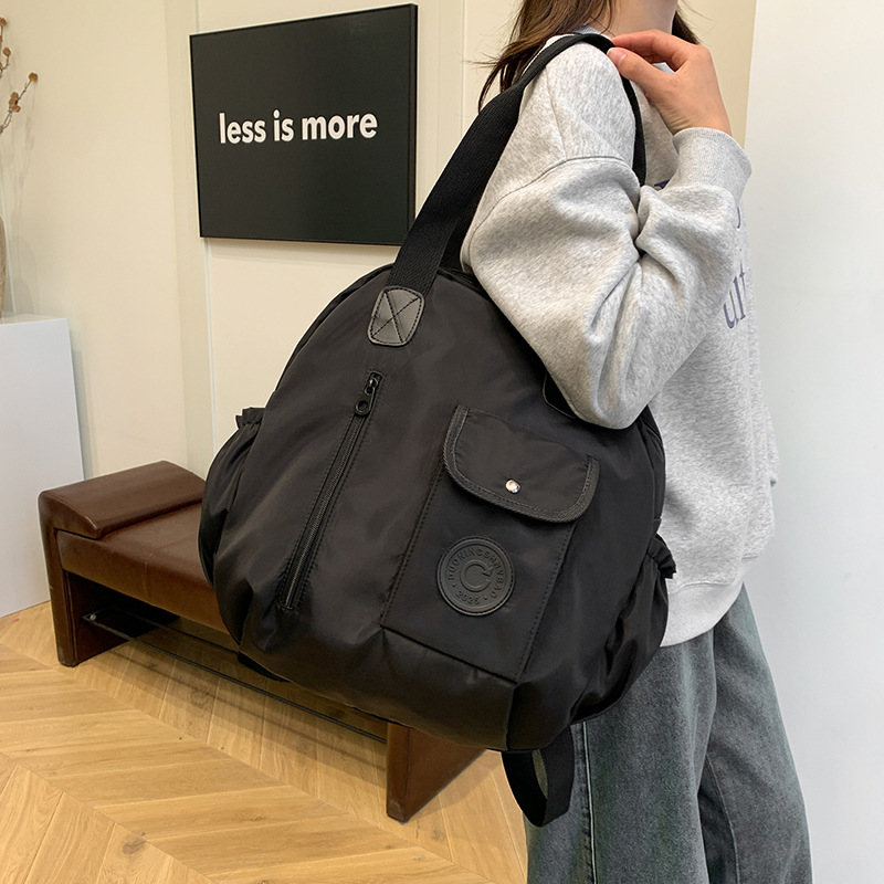 New autumn/Winter 2024 niche design, large-capacity, lightweight and simple backpack, high-quality hand-held shoulder crossbody bag details Picture