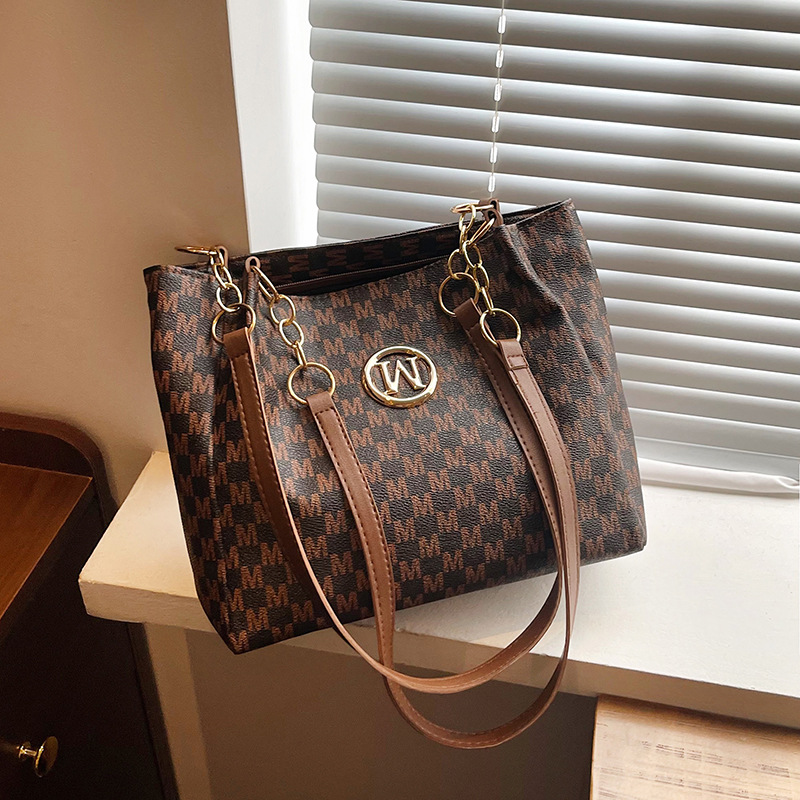 This year's fashionable bucket bag for women 2025, a new niche underarm bag, a stylish and individual single-shoulder bag, and a printed crossbody bag full figure