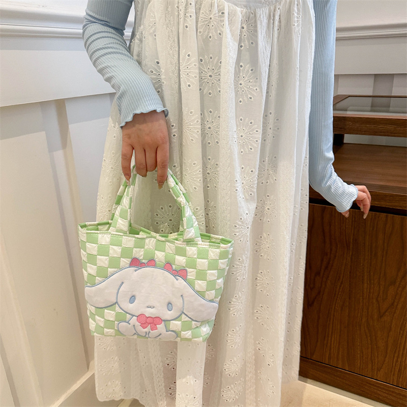 Cartoon canvas handbag bag, large-capacity claw machine doll exchange, girlish travel coin purse bag, daily storage details Picture