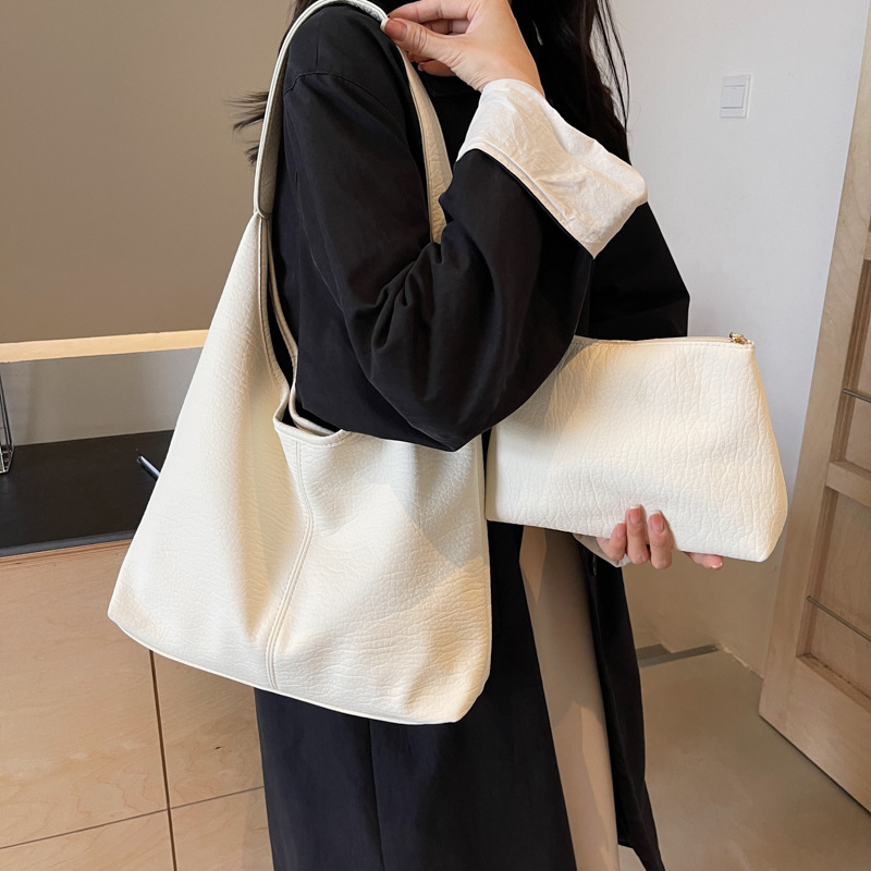 Large-capacity women's bag, 2025 new style, high-end soft leather underarm single-shoulder bun, mother commuting tote bag full figure