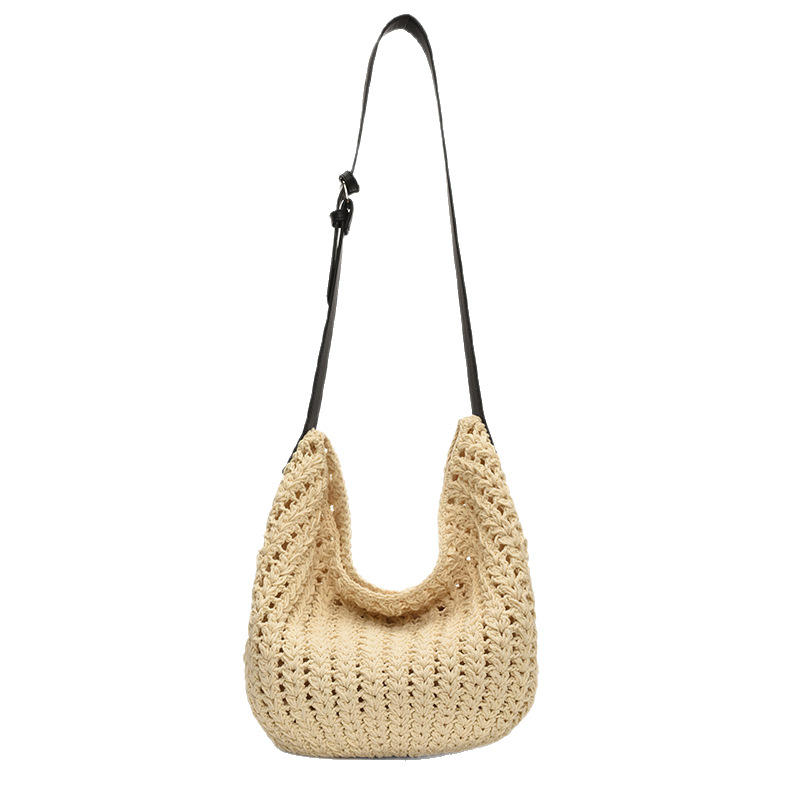 This is a new summer 2025 trendy retro hollowed-out woven single-shoulder bag for women, featuring a seaside vacation style and a large capacity bucket bag Item Picture