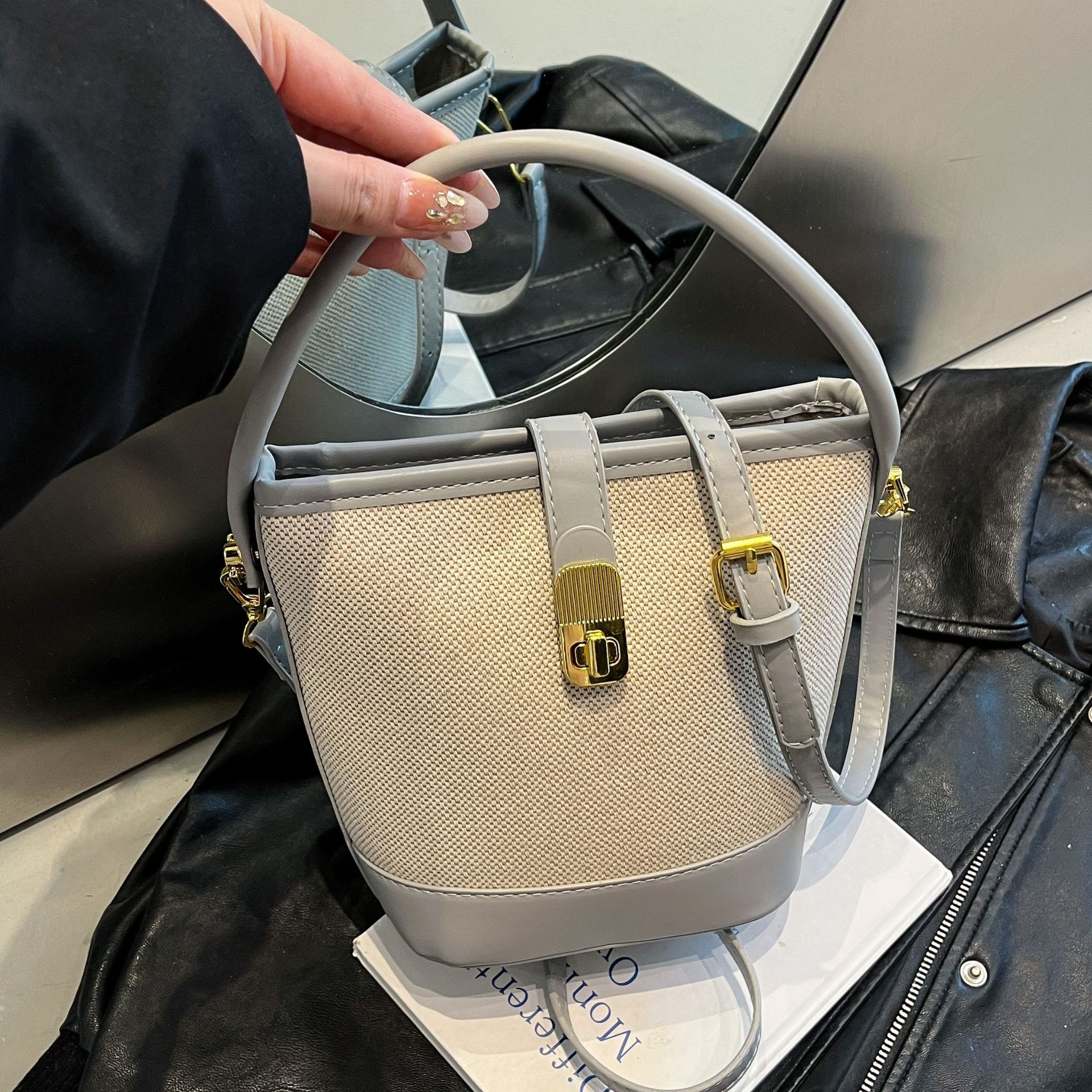 Cross-border niche retro bag for women, 2025 new style, high-end and versatile hand-held bucket bag, single-shoulder crossbody bag full figure