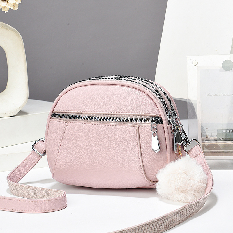 The new cross-border high-quality Little Apple crossbody bag, the popular big eater three-layer mobile phone bag, and the casual and trendy single-shoulder bag for women Application Scenario