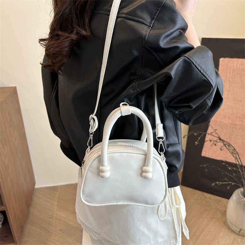 Solid color textured small bag for women, 2025 new summer simple pillow bag, single-shoulder crossbody bag, stylish hand-held small bag details Picture