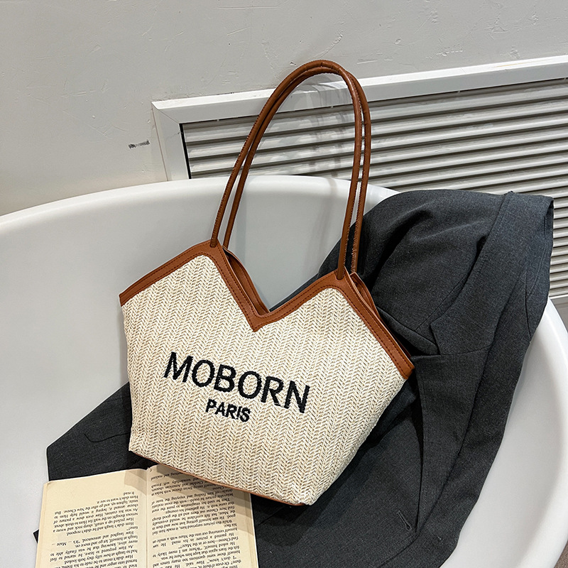 A trendy women's 2025 straw woven casual single-shoulder underarm bag and a fashionable letter-color casual tote bag full figure