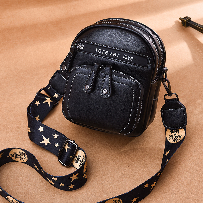 The new mini women's bag for 2022 is a multi-functional, versatile, mobile newspaper, and popular single-shoulder crossbody small round bag full figure