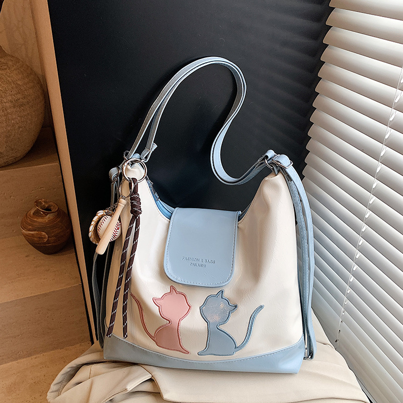The new women's 2025 large-capacity backpack is a multi-functional and versatile single-shoulder tote bag for commuting to school and work full figure