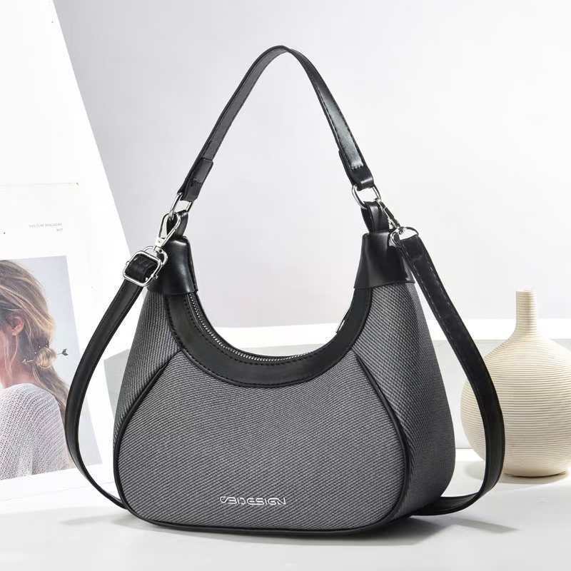 The new underarm handbag, the crescent-shaped women's bag, has a high appearance level. It is a cross-border versatile and fashionable single-shoulder bag and a trendy crossbody bag full figure