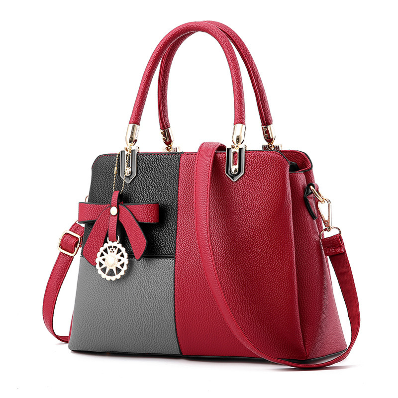 Factory direct sales of women's bags 2022: Simple and trendy handbags, large-capacity European and American single-shoulder bags with contrasting colors, one-piece consignment full figure