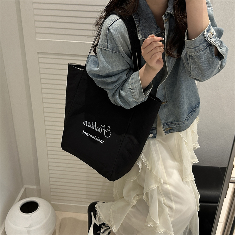 Red double-sided striped canvas bag for women, Korean style Instagram casual tote single-shoulder bag, large capacity, laid-back style bag trend details Picture