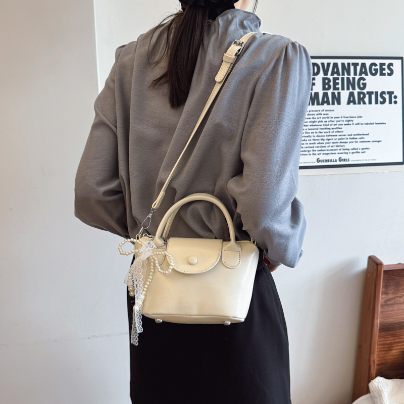 Popular women's retro 2025 Spring New style bag cover casual crossbody bag Korean version hand-held bucket bag details Picture