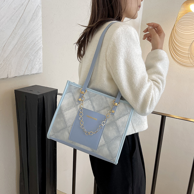 High-quality large bag 2023 Winter new trendy color-blocking women's bag, large-capacity commuting versatile hand-held tote bag details Picture