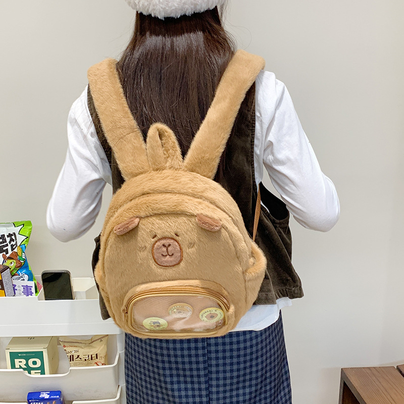 The new cartoon Japanese-style ins Lapibara backpack is cute and has a large capacity. It's a capybara class backpack and a claw machine doll Application Scenario