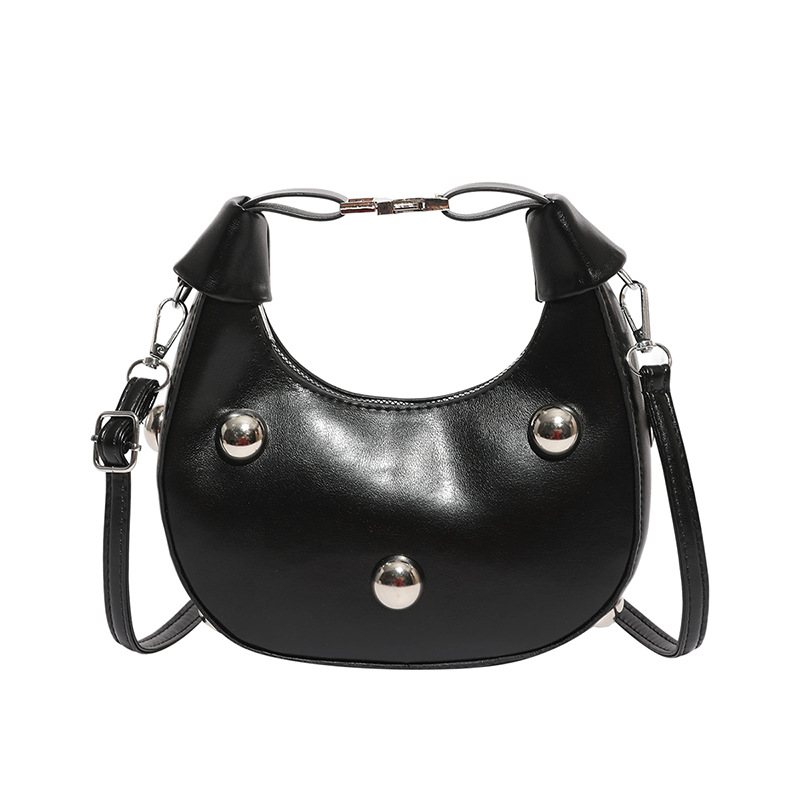 In 2025, a simple, stylish, casual and individualistic hot girl style riveted new trend crossbody hand-held dumpling bag for women's commuting Item Picture