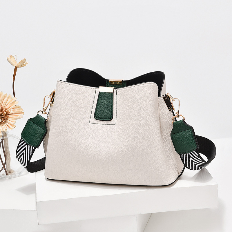 Small bag Women's Bag 2022 new style bucket bag, trendy casual color contrast wide shoulder strap single-shoulder crossbody bag, one-piece consignment details Picture