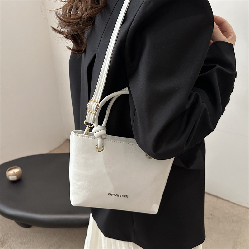 Simple and fashionable handbag for women, Spring 2025 new retro basket bag, solid color commuting single-shoulder crossbody bag details Picture
