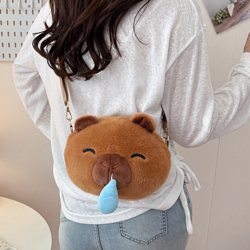 New capybara snot drawable crossbody backpack, creative plush bag, girlish travel loose change key bag Application Scenario
