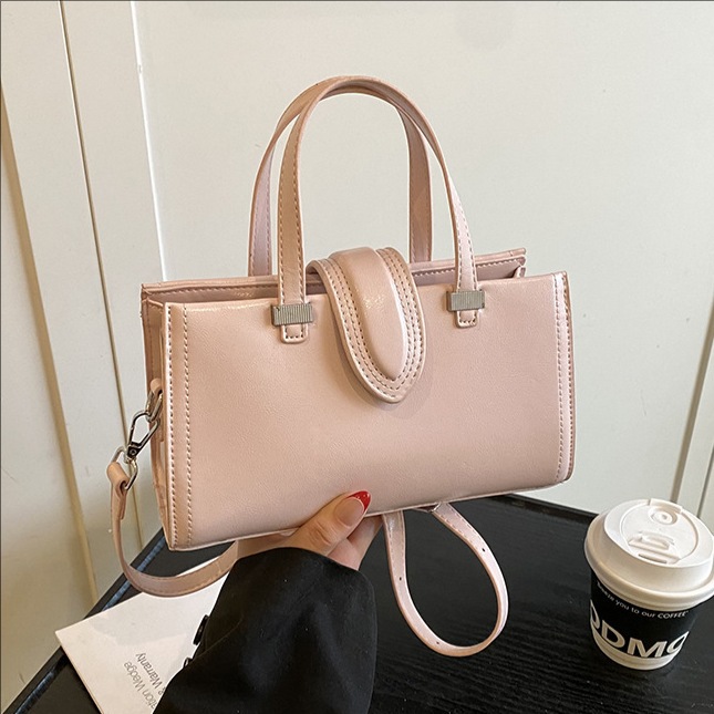 The 2025 new style of fashionable and high-end solid color handbag for women, Korean style, simple and versatile, commuting single-shoulder crossbody bag full figure