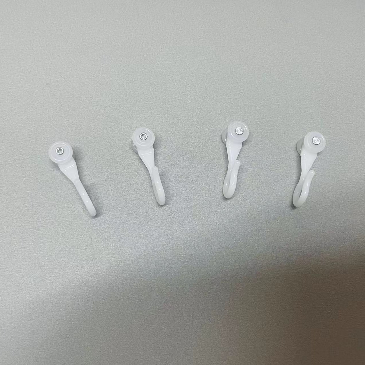 Wholesale of curtain curtain rail, plastic pulley, mosquito net pulley hook, curtain mosquito net pulley, curtain accessories details Picture