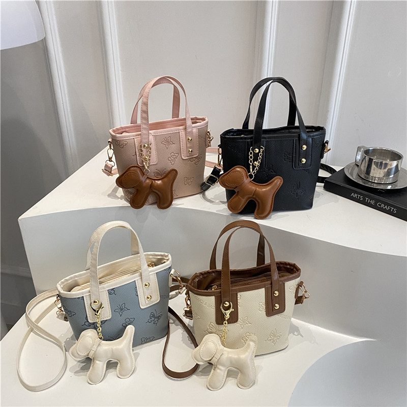 Hand-held fashionable bow bucket bag for women, summer 2025, Korean style, simple and versatile single-shoulder bag, high-end crossbody bag Application Scenario