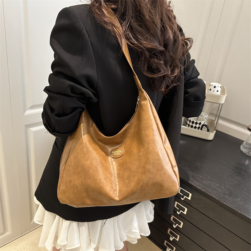 2025 Summer New Women's dumpling bag, high-end, simple and fashionable daily wear, casual tote bag, commuting bag details Picture