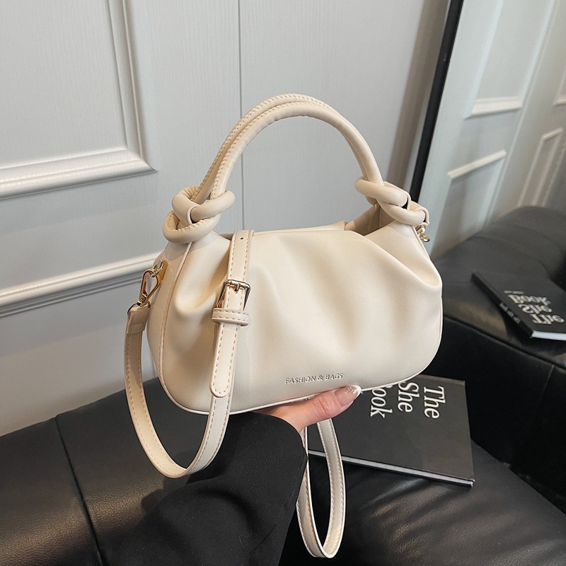 The 2025 new style of simple and casual hand-held pleated bucket bag is a high-end, trendy and versatile crossbody bag full figure