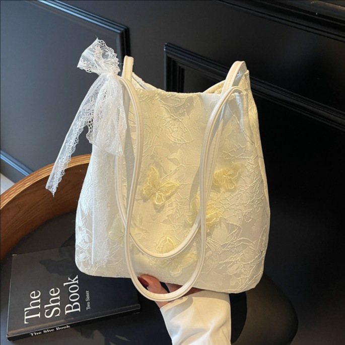 2025 New stylish and simple hand-held underarm bag for women, three-dimensional butterfly silk, versatile for commuting, single-shoulder bucket bag full figure