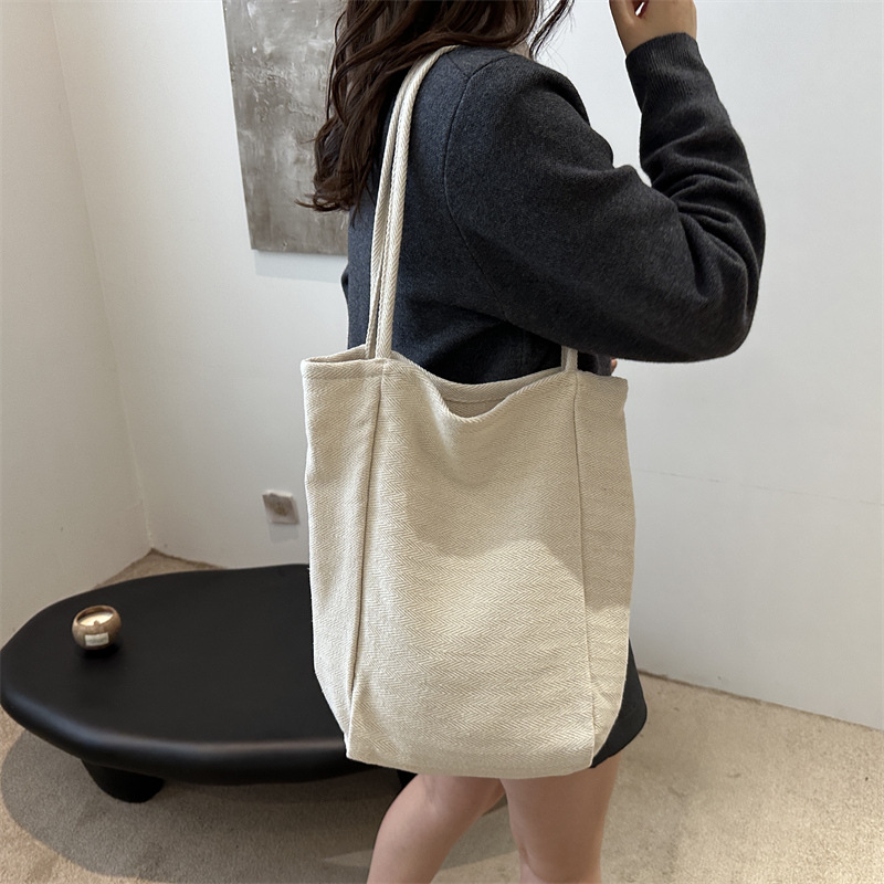 Korean-style artistic striped canvas bag 2024, casual, simple, large-capacity, laid-back style rope hand-held shoulder tote bag details Picture