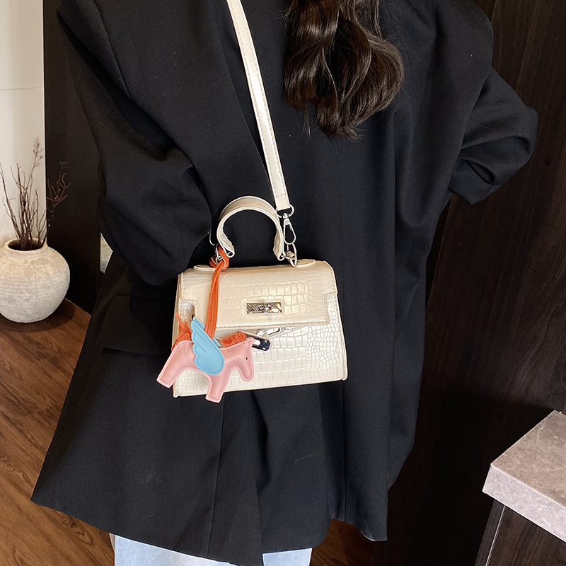 The high-end Kelly bag for women in 2025 is a new style of fashionable and casual stone pattern single-shoulder bag and a trendy solid color crossbody bag Specification drawing