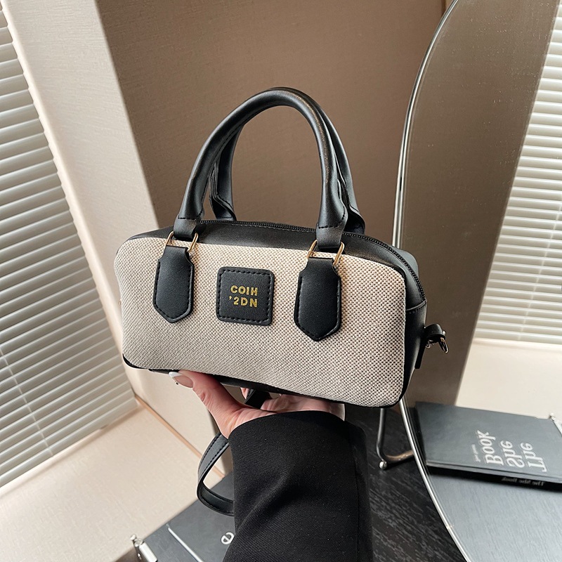 A niche color-blocking bowling bag for women, a new 2025 high-end canvas handbag, a retro single-shoulder crossbody bag full figure