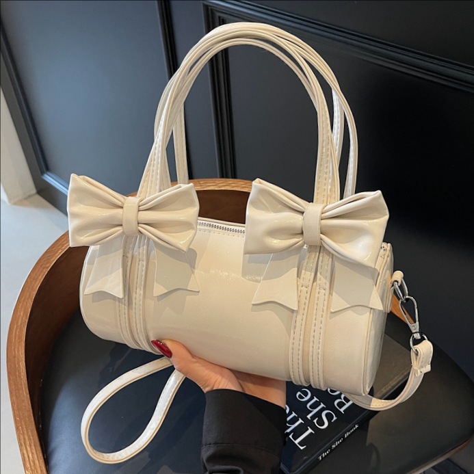 A super popular niche bow handbag for women, a new 2025 versatile single-shoulder underarm bag, a casual crossbody cylinder bag full figure