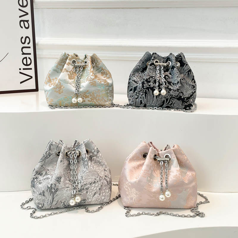 Hand-held pearl bucket bag for women, Spring 2025, new Chinese-style embroidered single-shoulder bag, niche, simple and high-end crossbody bag Application Scenario