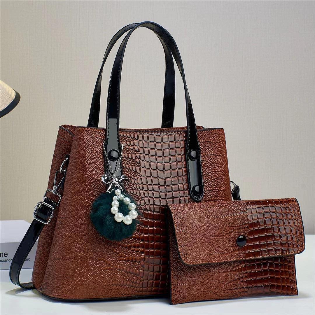 The 2023 new style of the "Mother and Child Bag" shiny leather two-piece set features a high-quality, large-capacity, single-shoulder, crossbody design for women details Picture