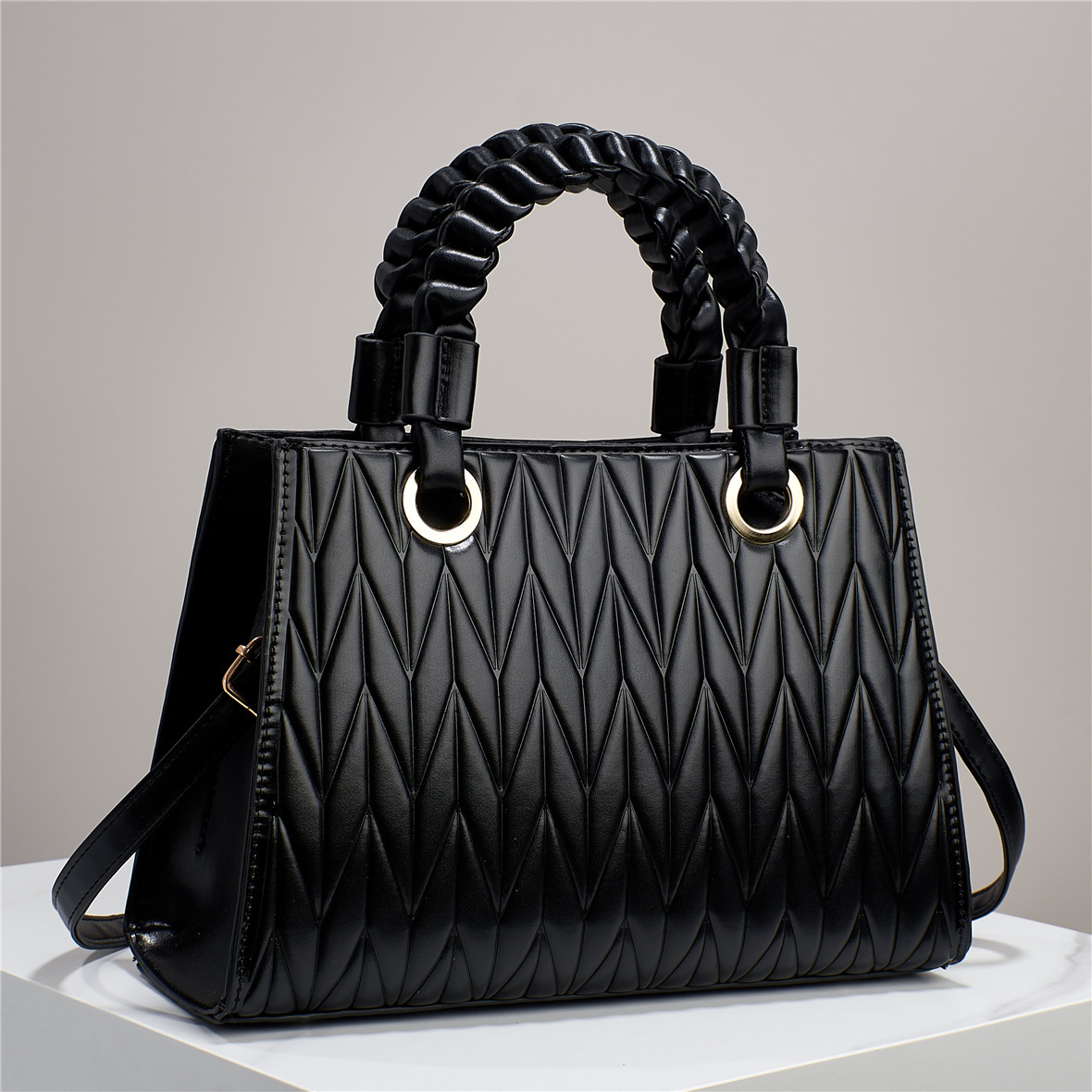 The 2025 new embroidered women's bag, with a high-end texture, is a hand-polished color single-shoulder crossbody bag for practical cross-border commuting full figure