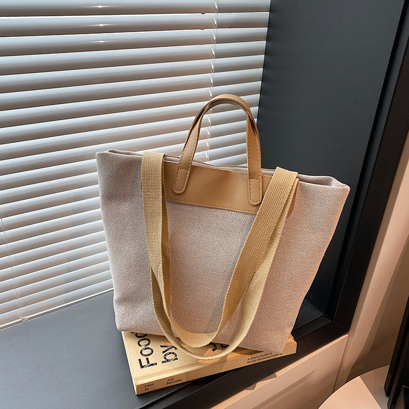 High-quality and fashionable single-shoulder large bag for women's summer 2025, new color-blocking and patchwork commuter tote bag, large capacity bucket bag full figure