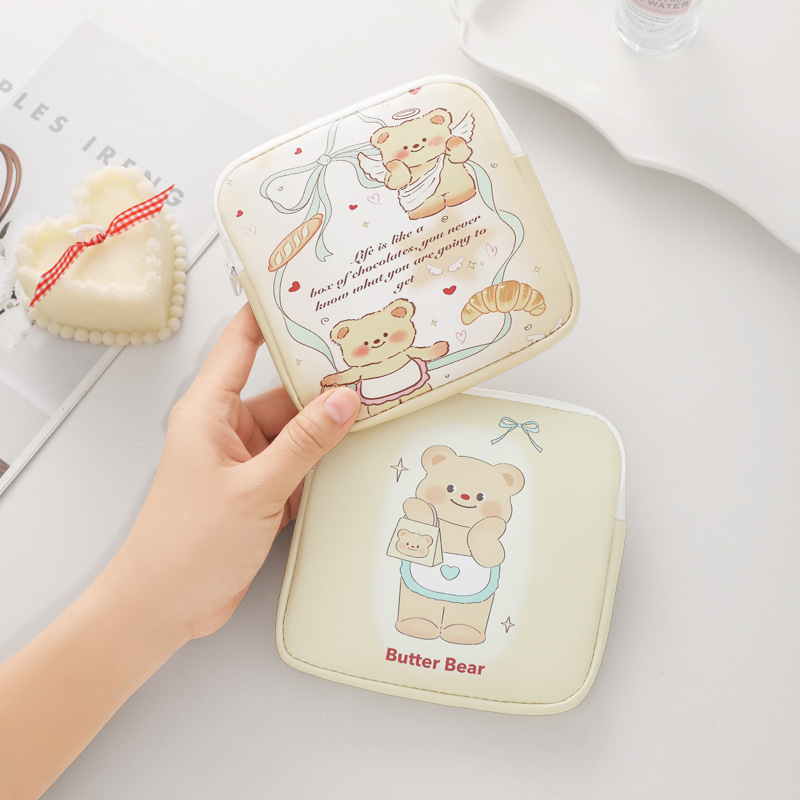 Cartoon cute storage bag, women's makeup bag, headphones, keys, cards, small item storage box, sanitary napkin bag, waterproof leather Application Scenario