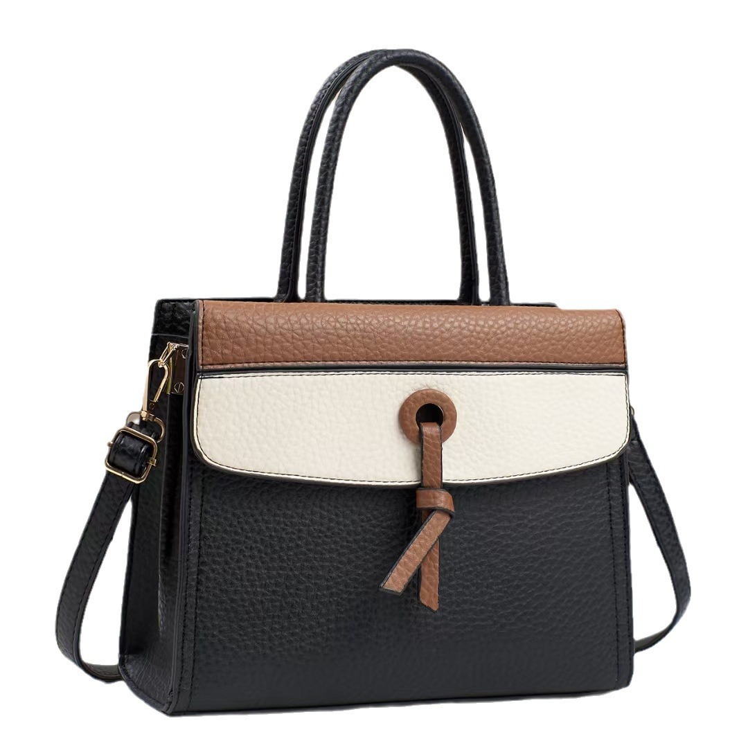 The new color-blocking handbag for foreign trade is a versatile single-shoulder tote bag with a fashionable color contrast and a high-end feel. It is a trendy crossbody bag with a patchwork design Item Picture