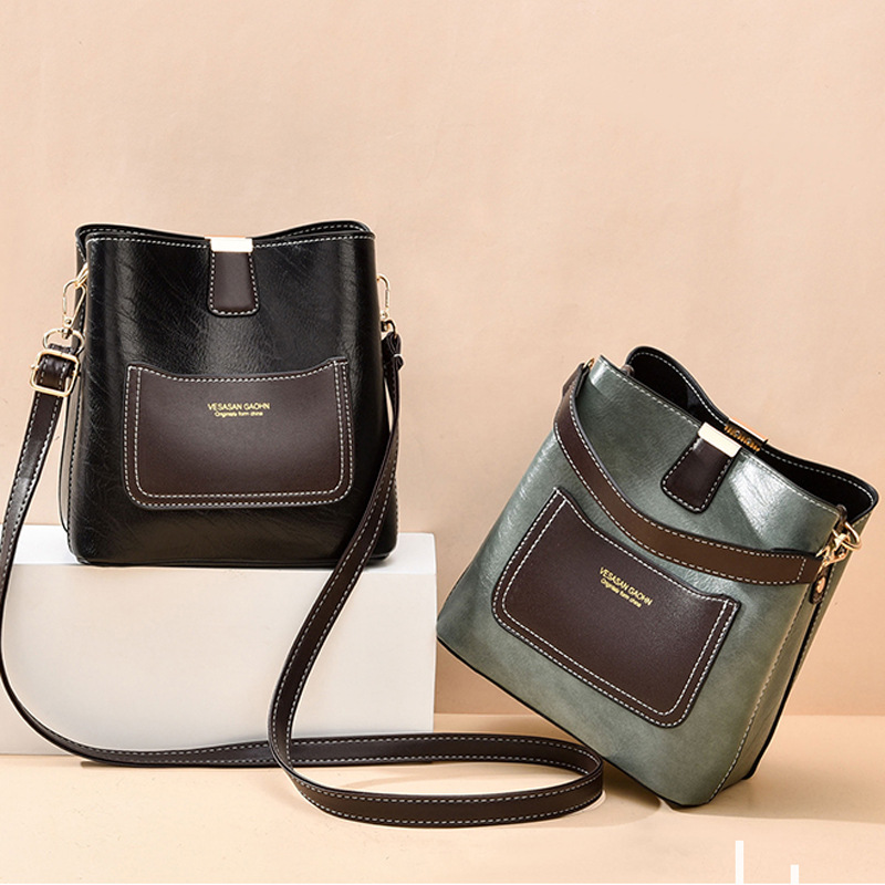 New 2022 ladies' bucket bag, fashionable color-blocking handbag, Korean-style solid color retro single-shoulder bag, casual crossbody bag details Picture