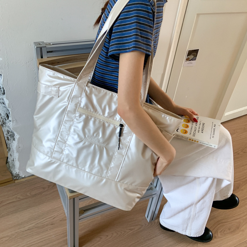 2025 New style simple outdoor travel tote bag, casual handbag, portable shoulder bag, large-capacity underarm bag for women details Picture