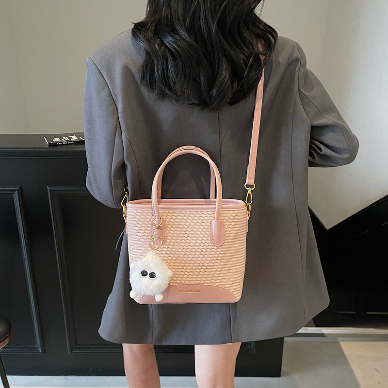 Korean niche design simple and casual hand-held bucket bag for women 2025 summer, a new straw weaving versatile crossbody bucket bag Specification drawing