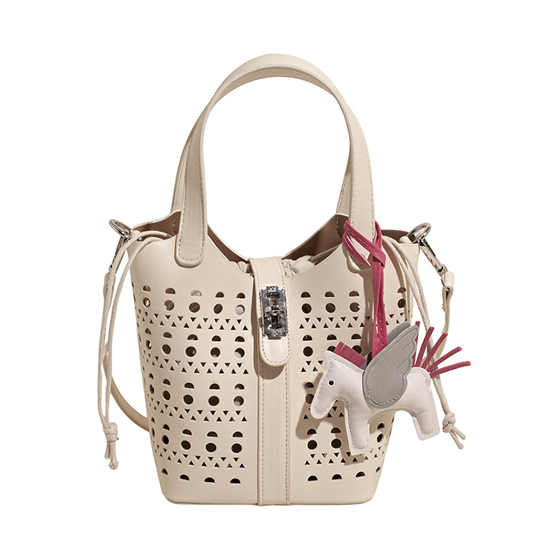 A niche hollowed-out bucket bag for women in 2025, a new fashionable vegetable basket handbag, a versatile shoulder bag, and a trendy crossbody bag Item Picture