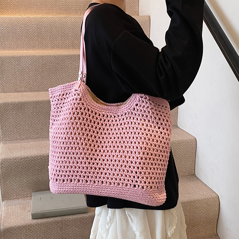 Hollowed-out knitted large-capacity bucket bag for women, 2025 new style, versatile for seaside vacation, beach and commuting, single-shoulder bag full figure