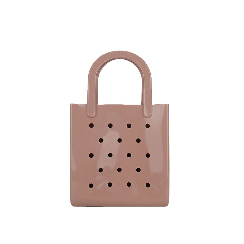 Cross-border solid color jelly bag for women 2025 new Summer hollowed-out macaron-colored beach wash basket pvc handbag Item Picture