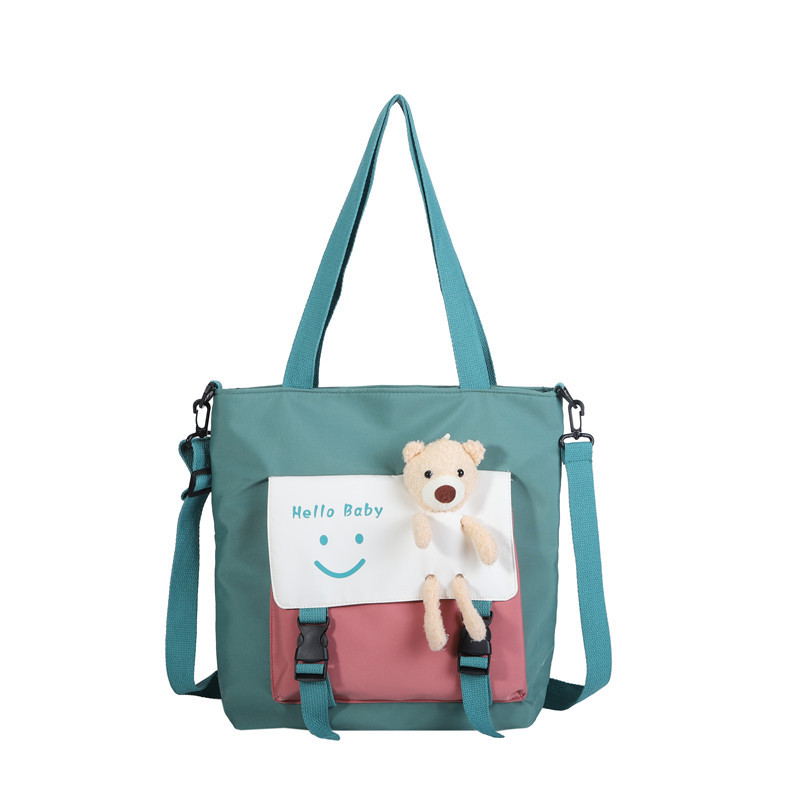 A simple and cute tote bag in Harajuku style, a large-capacity hand-held crossbody bag, a fashionable and casual student bag for class, a single-shoulder bag for girls Item Picture
