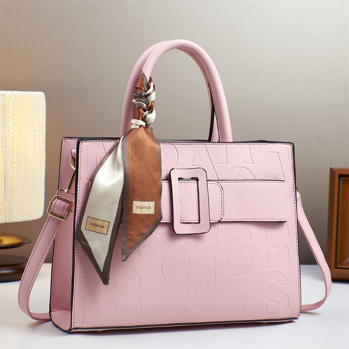 The 2025 new letter embossed handbag features a fashionable design. It is a simple and versatile bag for cross-border use, making it a perfect gift for mom and girl Application Scenario