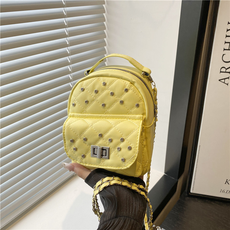A new 2025 trendy and versatile Korean chain-texted crossbody backpack for women full figure